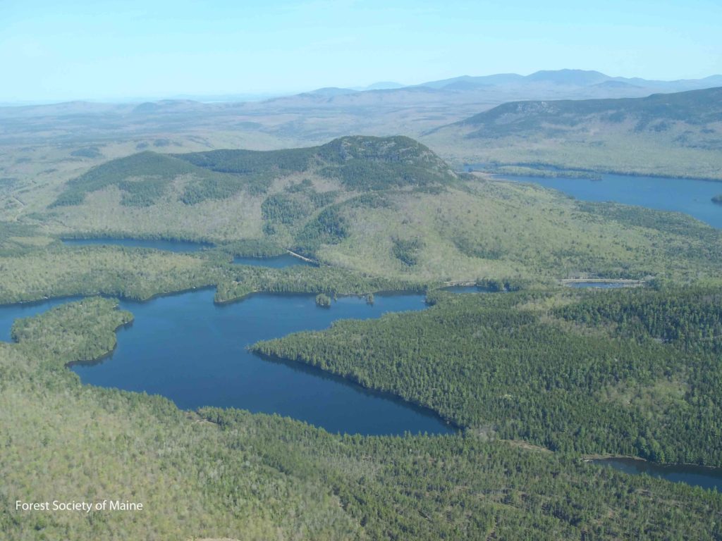 Aerial view of Little Greenwood Pond, Lake Onawa, Borestone Mountain, and Barren Mountain (traversed by the Appalachian Trail).