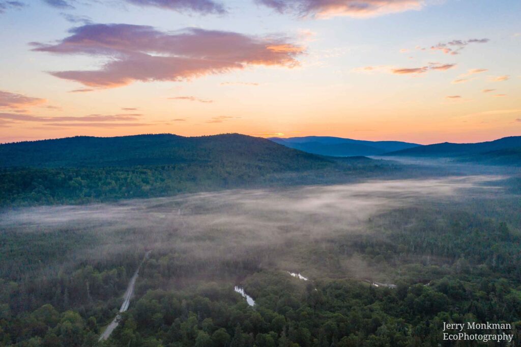 Sunrise over the Swift Cambridge River looking east over Popple Dam Rd in Grafton Township, Maine. Photo by Jerry Monkman, EcoPhotography.